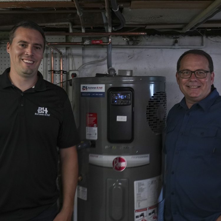 Mike and Josh with new water heater.